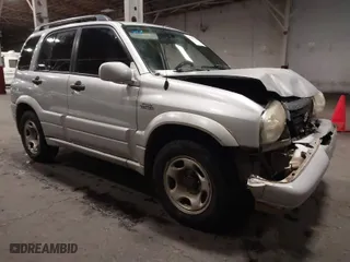 2002 Suzuki Grand Vitara JLX with VIN JS3TD62V324161291, listed as a IAAI auction lot 41577344 with 164,658 mi miles. Bid and sale history available at carsss.com. Image 1.