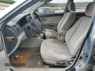 2007 Kia Spectra EX z VIN KNAFE121775389527, wystawiony jako Copart lot #56517285 z przebiegiem 340 861 mil mil oraz Szkoda całkowita • Salvage title. Historia ofert i sprzedaży dostępna na DreamBid. Obrazek 7.