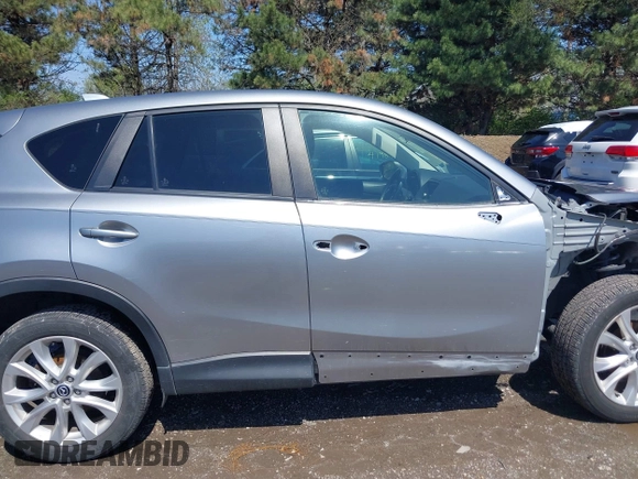 2013 Mazda CX-5 Grand Touring with VIN JM3KE4DE9D0137085, listed as a IAAI auction lot 41978534 with 103,720 mi miles and . Bid and sale history available at carsss.com. Image 14.