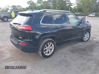 2014 Jeep Cherokee Altitude with VIN 1C4PJMCB5EW146365, listed as a IAAI auction lot 42021350 with 120,652 mi miles and . Bid and sale history available at carsss.com. Image 4.