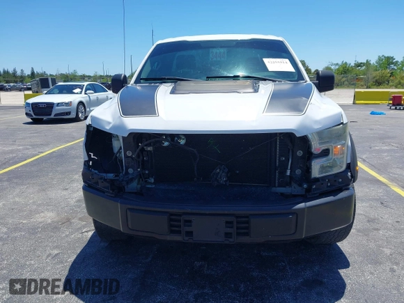 2016 Ford F-150 XL with VIN 1FTMF1C88GKE64899, listed as a IAAI auction lot 42255514 with 140,626 mi miles and . Bid and sale history available at DreamBid. Image 13.