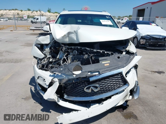 2016 Infiniti QX60 with VIN 5N1AL0MMXGC511972, listed as a IAAI auction lot 41979787 with 127,298 mi miles and . Bid and sale history available at DreamBid. Image 12.