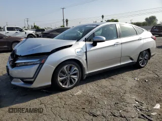 2018 Honda Clarity Touring z VIN JHMZC5F38JC005510, wystawiony jako Copart lot #61353305 z przebiegiem 312 901 mil mil oraz Szkoda całkowita • Salvage title. Historia ofert i sprzedaży dostępna na DreamBid. Obrazek 1.