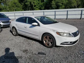 2013 Volkswagen CC Sport z VIN WVWBN7AN7DE511176, wystawiony jako Copart lot #54985945 z przebiegiem 102 993 mil mil oraz Czysty tytuł • Clean title. Historia ofert i sprzedaży dostępna na DreamBid. Obrazek 4.