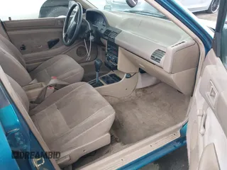 1994 Ford Escort with VIN 3FARP15J4RR144017, listed as a IAAI auction lot 42398050 with 81,539 mi miles and . Bid and sale history available at DreamBid. Image 5.