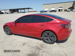 2021 Tesla Model 3 Standard Range Plus with VIN 5YJ3E1EA7MF915053, listed as a Copart auction lot 51172815 with 69,303 mi miles and Salvage Title. Bid and sale history available at DreamBid. Image 2.