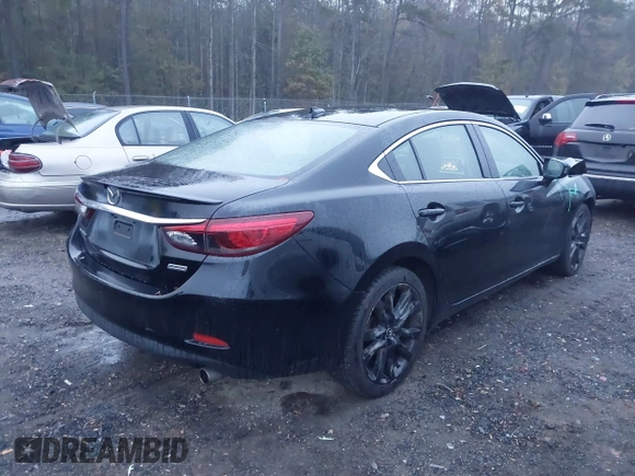 2016 Mazda 6 i Grand Touring with VIN JM1GJ1W54G1436875, listed as a IAAI auction lot 40841611 with 78,796 mi miles and . Bid and sale history available at carsss.com. Image 4.