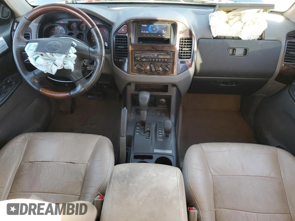 2001 Mitsubishi Montero Limited z VIN JA4MW51R41J037651, wystawiony jako Copart lot #43964815 z przebiegiem 155 578 mil mil oraz Tytuł czysty. Historia ofert i sprzedaży dostępna na DreamBid. Obrazek 8.