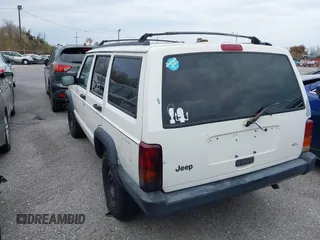 1998 Jeep Cherokee Sport with VIN 1J4FT68S5WL199283, listed as a IAAI auction lot 38377285 with 208,074 mi miles. Bid and sale history available at carsss.com. Image 3.