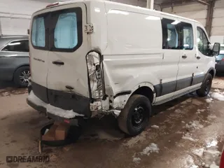 2016 Ford Transit Cargo Van with VIN 1FTYR1ZM1GKB35717, listed as a IAAI auction lot 41711883 with 183,157 mi miles. Bid and sale history available at carsss.com. Image 6.