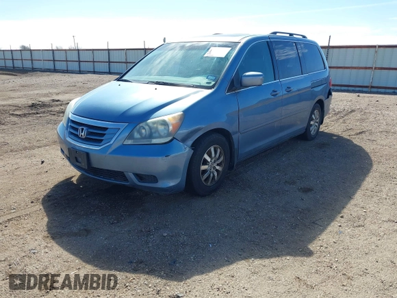 2010 Honda Odyssey EX-L with VIN 5FNRL3H7XAB052742, listed as a IAAI auction lot 41705935 with 205,190 mi miles and . Bid and sale history available at DreamBid. Image 2.