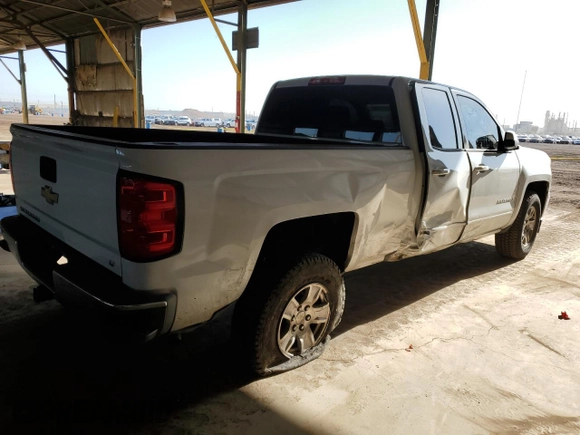 2017 Chevrolet Silverado 1500 LT with VIN 1GCRCREC0HZ387694, listed as a Copart auction lot 52417595 with 154,054 mi miles and Salvage Title. Bid and sale history available at DreamBid. Image 3.