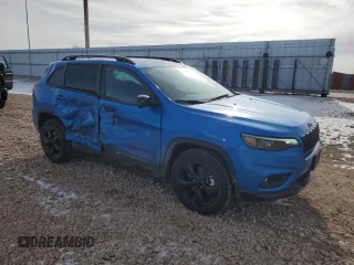 2023 Jeep Cherokee Altitude Lux with VIN 1C4PJMMB8PD104673, listed as a Copart auction lot 44190335 with 26,617 mi miles and Salvage Title. Bid and sale history available at carsss.com. Image 4.
