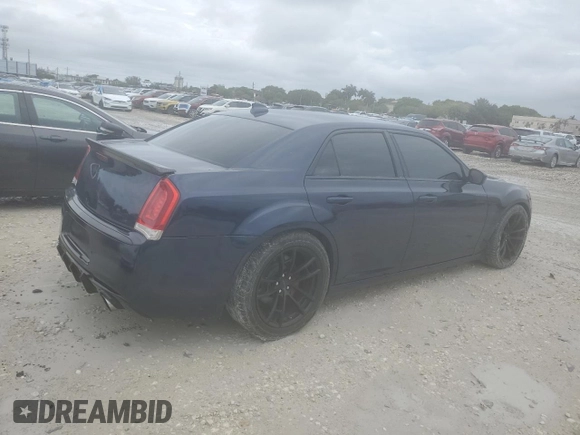 2016 Chrysler 300 Anniversary Edition z VIN 2C3CCAAG6GH334517, wystawiony jako Copart lot #56850205 z przebiegiem 27 927 mil mil oraz Czysty tytuł • Clean title. Historia ofert i sprzedaży dostępna na DreamBid. Obrazek 3.
