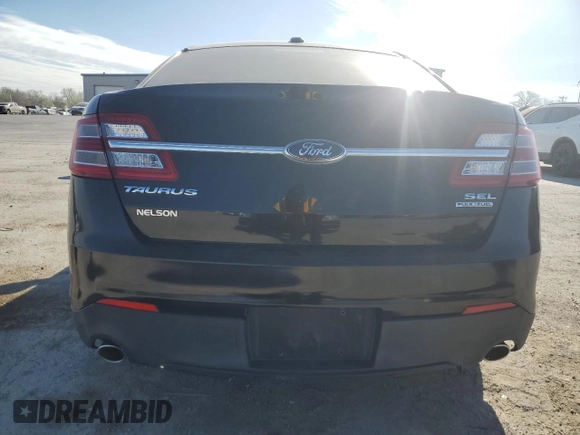 2014 Ford Taurus SEL with VIN 1FAHP2E88EG179093, listed as a Copart auction lot 50060975 with 198,096 mi miles and Salvage Title. Bid and sale history available at carsss.com. Image 6.
