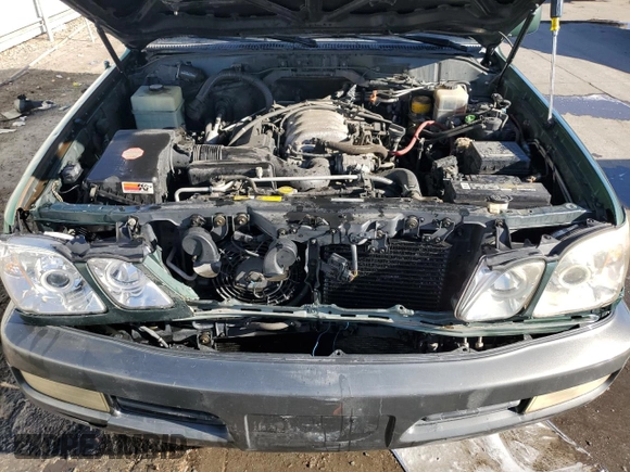 1999 Lexus LX 470 z VIN JT6HT00W0X0069481, wystawiony jako Copart lot #43588185 z przebiegiem 297 554 mil mil oraz Szkoda całkowita • Salvage title. Historia ofert i sprzedaży dostępna na DreamBid. Obrazek 12.