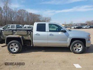 2016 Chevrolet Silverado 1500 LT with VIN 1GCVKREC4GZ125676, listed as a IAAI auction lot 42006237 with 114,699 mi miles. Bid and sale history available at carsss.com. Image 13.