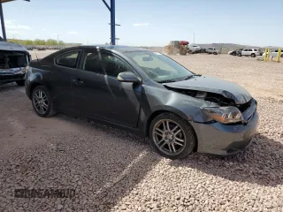 2010 Scion tC with VIN JTKDE3B70A0312506, listed as a Copart auction lot 48233795 with 134,695 mi miles and Salvage Title. Bid and sale history available at carsss.com. Image 4.
