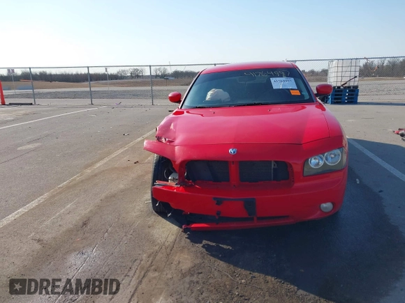 2010 Dodge Charger SXT with VIN 2B3CA3CV0AH197611, listed as a IAAI auction lot 41764997 with 211,670 mi miles and . Bid and sale history available at DreamBid. Image 13.
