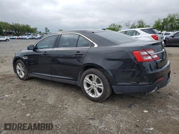 2014 Ford Taurus SEL z VIN 1FAHP2E85EG184686, wystawiony jako Copart lot #55862775 z przebiegiem 238 217 mil mil oraz Czysty tytuł • Clean title. Historia ofert i sprzedaży dostępna na DreamBid. Obrazek 2.