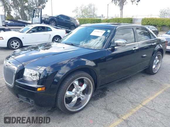 2007 Chrysler 300 with VIN 2C3KA43R57H852331, listed as a IAAI auction lot 41946742 with 211,168 mi miles. Bid and sale history available at carsss.com. Image 18.