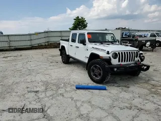 2021 Jeep Gladiator Rubicon z VIN 1C6JJTBG0ML624275, wystawiony jako Copart lot #62840275 z przebiegiem Nie podano mil oraz Szkoda całkowita • Salvage title. Historia ofert i sprzedaży dostępna na DreamBid. Obrazek 14.