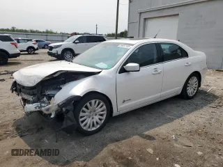 2011 Ford Fusion Hybrid z VIN 3FADP0L37BR152479, wystawiony jako Copart lot #59857155 z przebiegiem 126 594 mil mil oraz Czysty tytuł • Clean title. Historia ofert i sprzedaży dostępna na DreamBid. Obrazek 1.