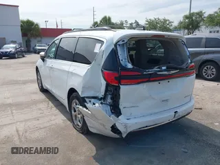 2023 Chrysler Pacifica Limited with VIN 2C4RC1GG7PR566163, listed as a IAAI auction lot 42393988 with 59,354 mi miles and . Bid and sale history available at DreamBid. Image 17.