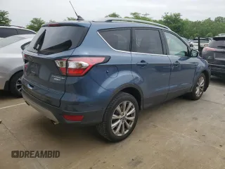 2018 Ford Escape Titanium with VIN 1FMCU9J93JUC01903, listed as a Copart auction lot 57337045 with 59,276 mi miles and Salvage title. Bid and sale history available at DreamBid. Image 3.