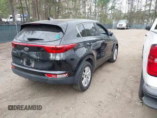 2017 Kia Sportage LX z VIN KNDPMCAC0H7131963, wystawiony jako IAAI lot #41872442 z przebiegiem 90 778 mil mil oraz . Historia ofert i sprzedaży dostępna na DreamBid. Obrazek 4.