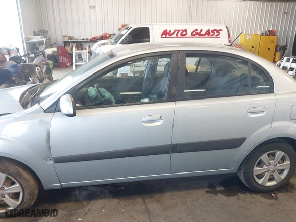 2009 Kia Rio with VIN KNADE223X96512538, listed as a IAAI auction lot 41765393 with NaN miles. Bid and sale history available at carsss.com. Image 14.
