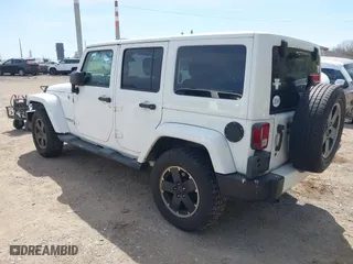 2012 Jeep Wrangler Unlimited Sahara with VIN 1C4HJWEG3CL254944, listed as a IAAI auction lot 42060981 with 172,358 mi miles. Bid and sale history available at carsss.com. Image 3.