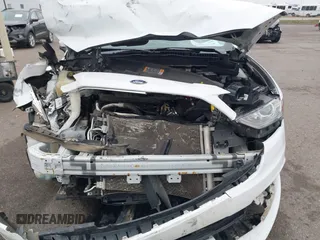 2018 Ford Fusion SE z VIN 3FA6P0H73JR212616, wystawiony jako IAAI lot #40869945 z przebiegiem 142 355 mil mil oraz . Historia ofert i sprzedaży dostępna na DreamBid. Obrazek 12.