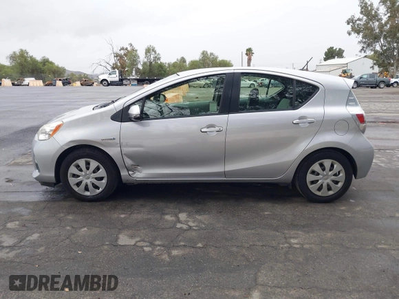 2014 Toyota Prius One with VIN JTDKDTB33E1067408, listed as a IAAI auction lot 41573895 with 245,383 mi miles and . Bid and sale history available at DreamBid. Image 14.