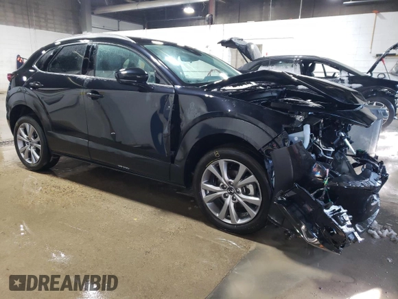 2023 Mazda CX-30 S Premium with VIN 3MVDMBDM0PM520591, listed as a Copart auction lot 48178215 with 9,999 mi miles and Salvage Title. Bid and sale history available at DreamBid. Image 4.