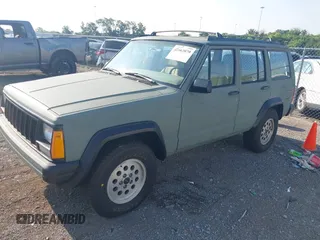 1992 Jeep Cherokee with VIN 1J4FT88S2NL251950, listed as a IAAI auction lot 42662079 with 1,689,263 mi miles and . Bid and sale history available at DreamBid. Image 2.