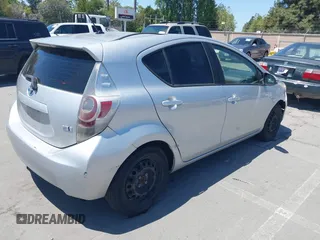 2014 Toyota Prius One with VIN JTDKDTB38E1061202, listed as a IAAI auction lot 42044747 with 133,409 mi miles and . Bid and sale history available at DreamBid. Image 4.