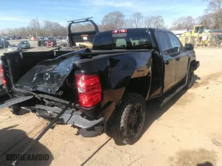 2018 Chevrolet Silverado 1500 LT with VIN 1GCVKREC9JZ256948, listed as a IAAI auction lot 41828882 with 63,209 mi miles. Bid and sale history available at carsss.com. Image 4.