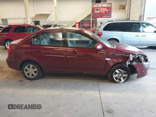 2007 Hyundai Accent GLS with VIN KMHCN46C27U111106, listed as a IAAI auction lot 41383317 with 147,882 mi miles. Bid and sale history available at carsss.com. Image 14.