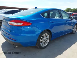 2020 Ford Fusion SE z VIN 3FA6P0HD8LR135668, wystawiony jako IAAI lot #42253008 z przebiegiem 69 625 mil mil oraz . Historia ofert i sprzedaży dostępna na DreamBid. Obrazek 4.