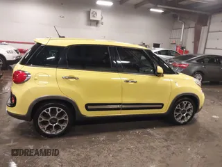 2015 FIAT 500L Urbana Trekking with VIN ZFBCFADH5FZ033844, listed as a IAAI auction lot 41186739 with 86,587 mi miles and . Bid and sale history available at DreamBid. Image 13.