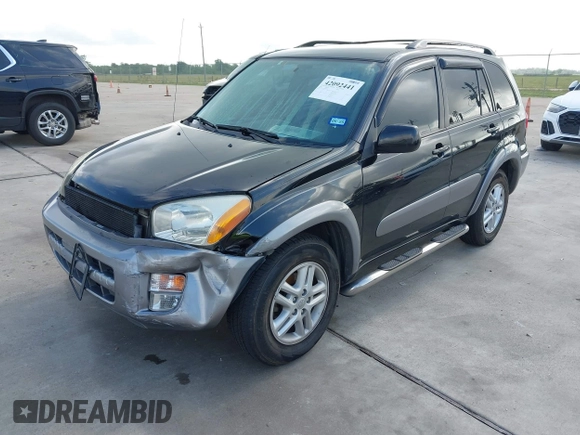 2001 Toyota RAV4 with VIN JTEGH20V910029962, listed as a IAAI auction lot 42092441 with 148,966 mi miles and . Bid and sale history available at DreamBid. Image 2.