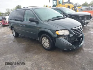 2006 Chrysler Town & Country LX with VIN 2A4GP44R96R615942, listed as a IAAI auction lot 42039452 with 158,009 mi miles and . Bid and sale history available at DreamBid. Image 1.
