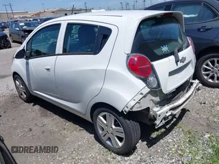 2015 Chevrolet Spark LS with VIN KL8CB6S94FC803190, listed as a IAAI auction lot 41999273 with 32,992 mi miles and . Bid and sale history available at DreamBid. Image 3.