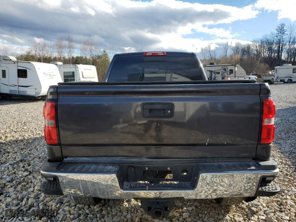 2015 GMC Sierra 2500HD available WiFi SLT with VIN 1GT12ZEG1FF180216, listed as a Copart auction lot 77076384 with NaN miles and Salvage Title. Bid and sale history available at carsss.com. Image 6.