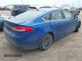 2017 Ford Fusion Hybrid Titanium с VIN 3FA6P0RU5HR388615, выставлен на аукционе IAAI как лот 42066142 с пробегом 121 618 миль миль и . История ставок и продаж доступна на DreamBid. Изображение 4.