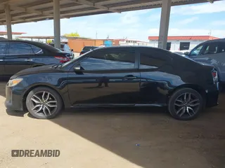 2014 Scion tC z VIN JTKJF5C75E3069757, wystawiony jako IAAI lot #42175725 z przebiegiem 191 054 mil mil oraz . Historia ofert i sprzedaży dostępna na DreamBid. Obrazek 14.