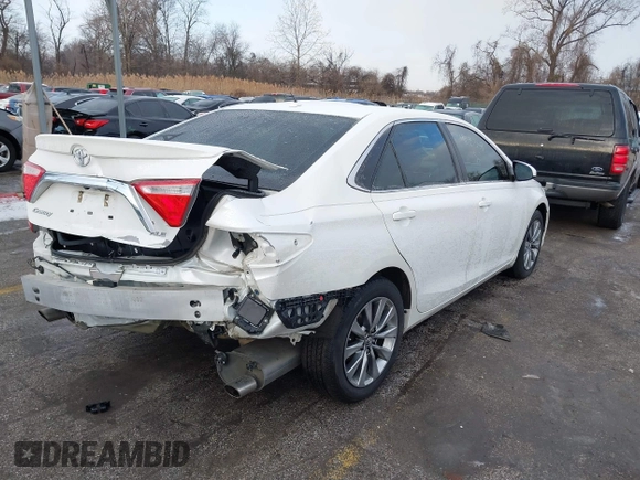 2016 Toyota Camry XSE with VIN 4T1BK1FK2GU570484, listed as a IAAI auction lot 41395359 with 122,852 mi miles. Bid and sale history available at carsss.com. Image 4.