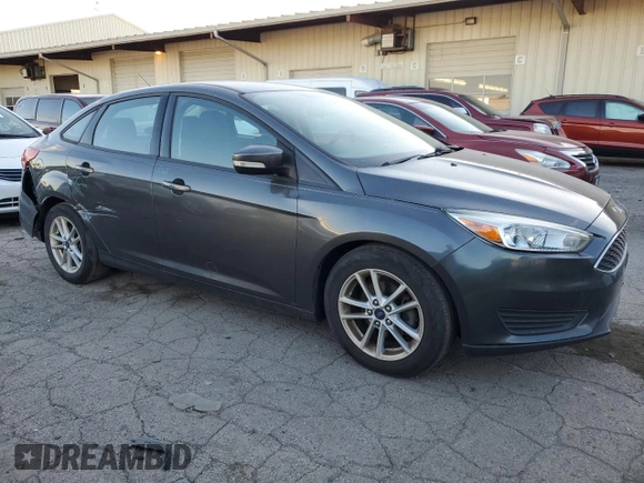 2017 Ford Focus SE z VIN 1FADP3F25HL331714, wystawiony jako Copart lot #77389764 z przebiegiem 49 953 mil mil oraz Szkoda całkowita • Salvage title. Historia ofert i sprzedaży dostępna na DreamBid. Obrazek 4.