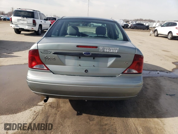 2003 Ford Focus SE with VIN 1FAFP34PX3W273906, listed as a Copart auction lot 46325405 with 129,861 mi miles and Salvage Title. Bid and sale history available at carsss.com. Image 6.